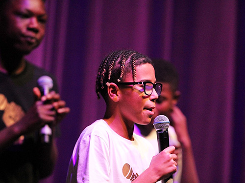 Boys on stage, rapping